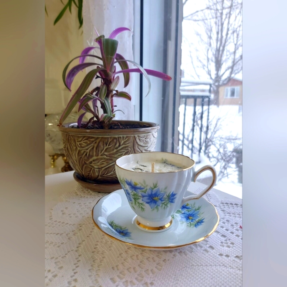 Candle in a pretty teacup with floral motifs